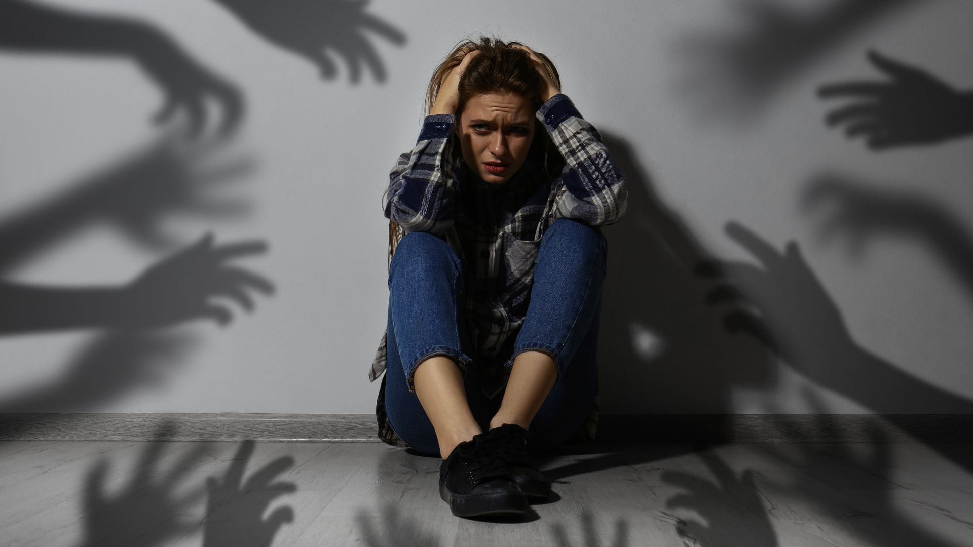 Young girl with paranoia symptoms